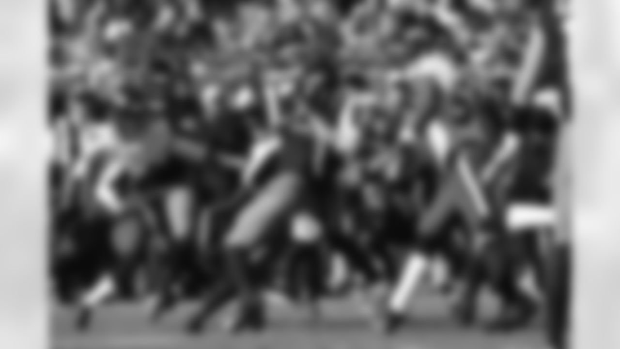Ravens players in action