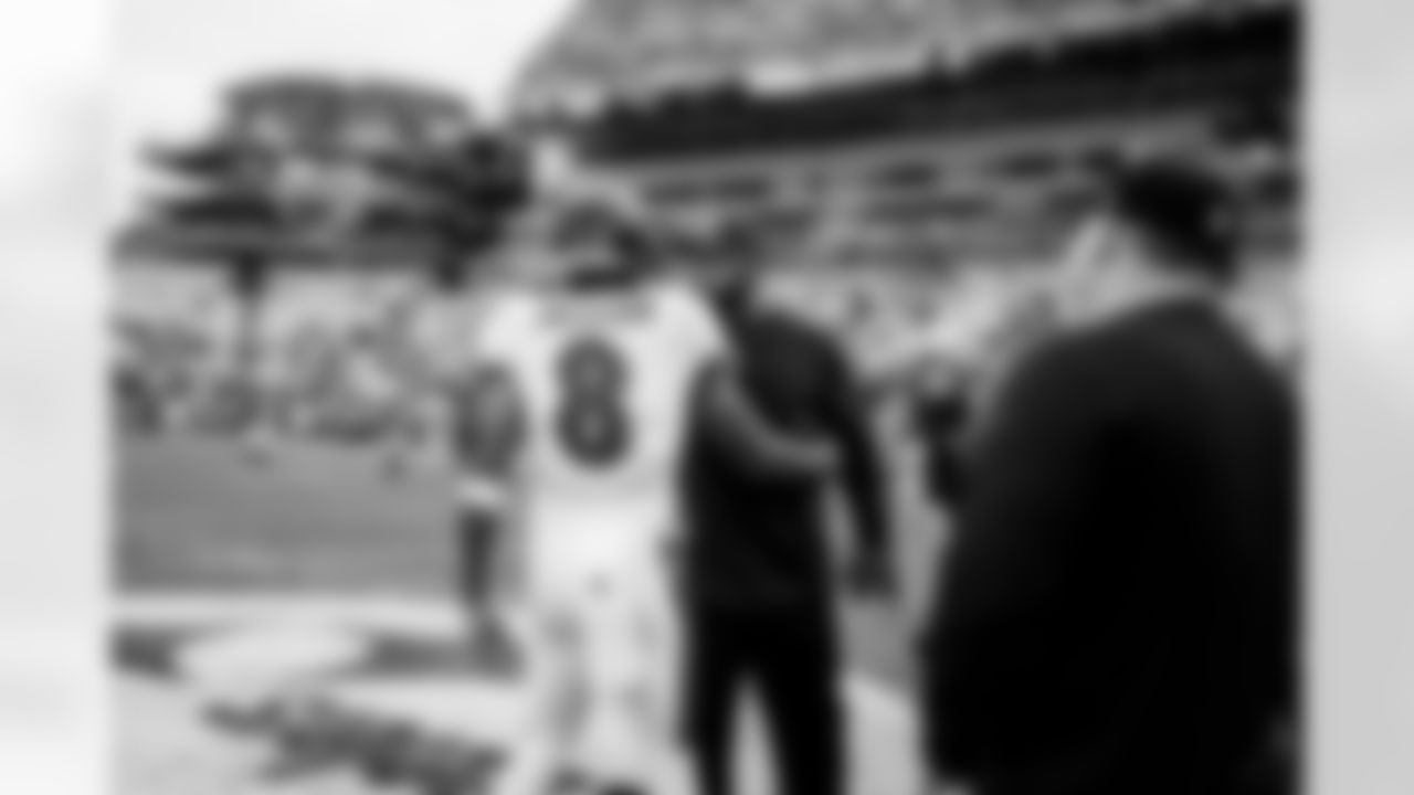 QB Lamar Jackson with Steelers Head Coach Mike Tomlin
