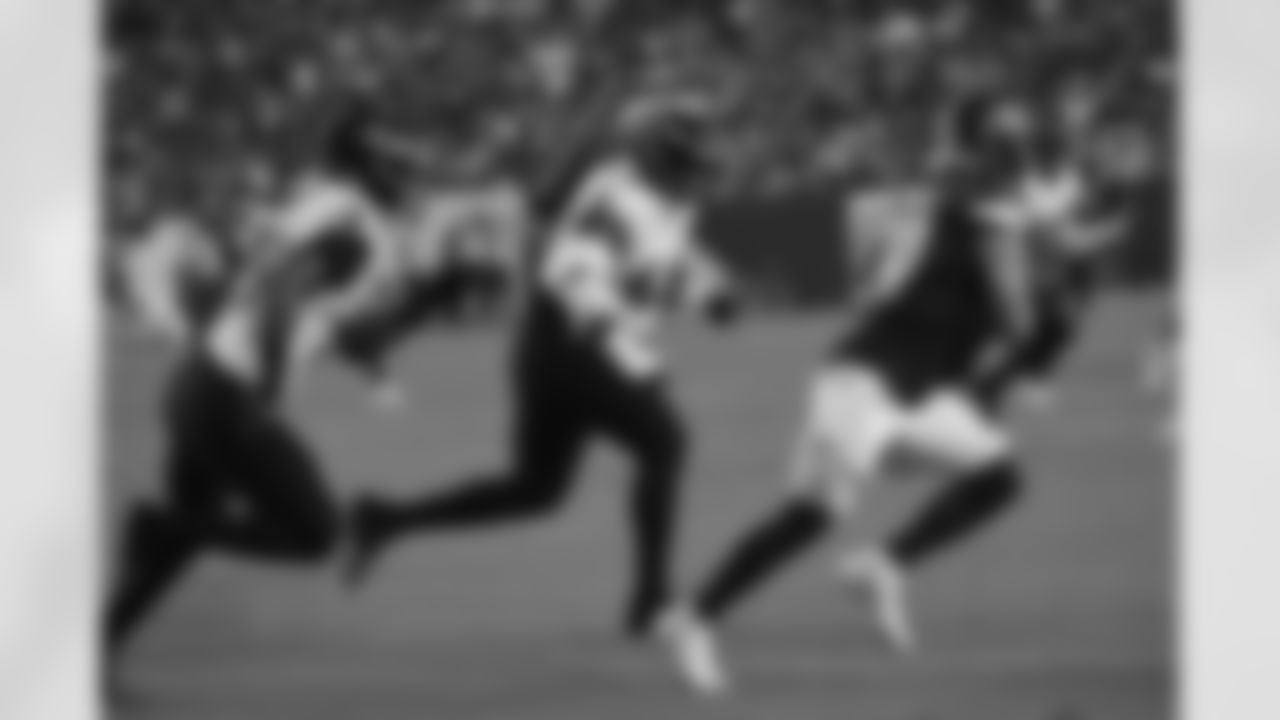Ravens players in action
