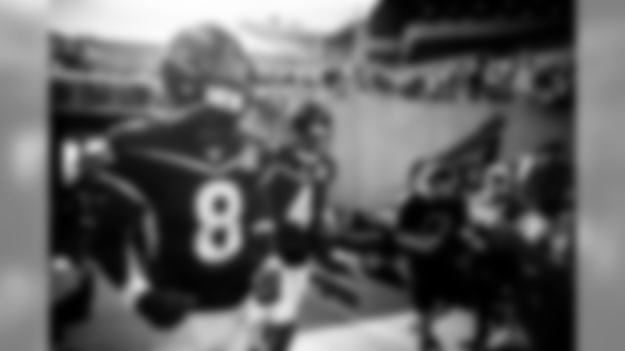 Quarterback Lamar Jackson and Houston Texans quarterback DeShawn Watson run out of the tunnel at the 2020 Pro Bowl game, Sunday, Jan. 26, 2020 in Orlando, Fla.