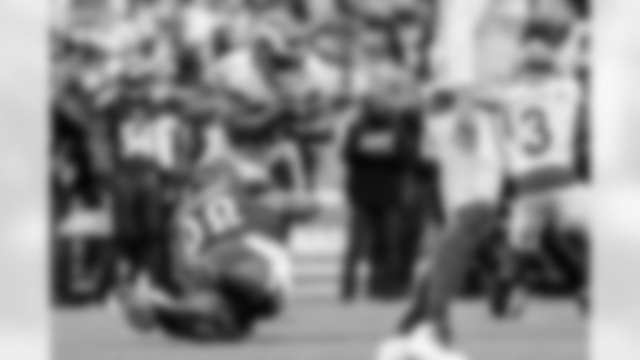 DT Brandon Williams makes a tackle for a loss