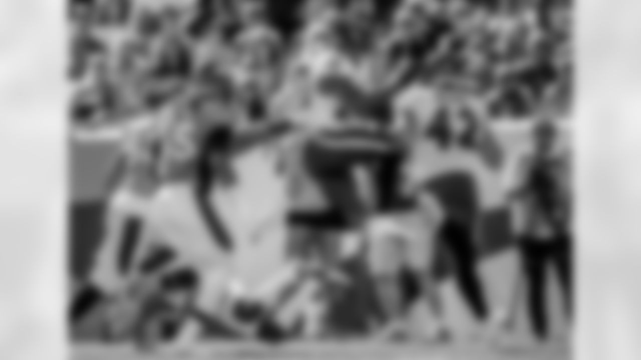 RB Latavius Murray leaps over a defender on his way to score a touchdown