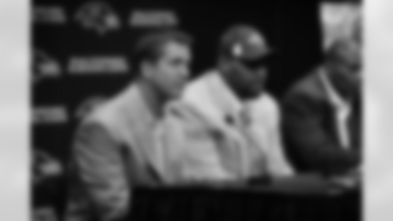 2009 Ravens first-round draft pick Michael Oher is introduced by GM Ozzie Newsome, Head Coach John Harbaugh and Director of Player Personnel Eric DeCosta at a press conference at the Ravens' Owings Mills Training Facility in April 2009.
