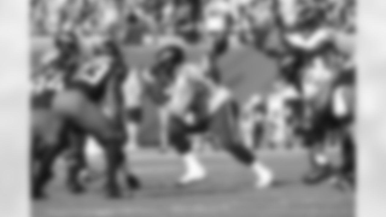 Ravens players in action