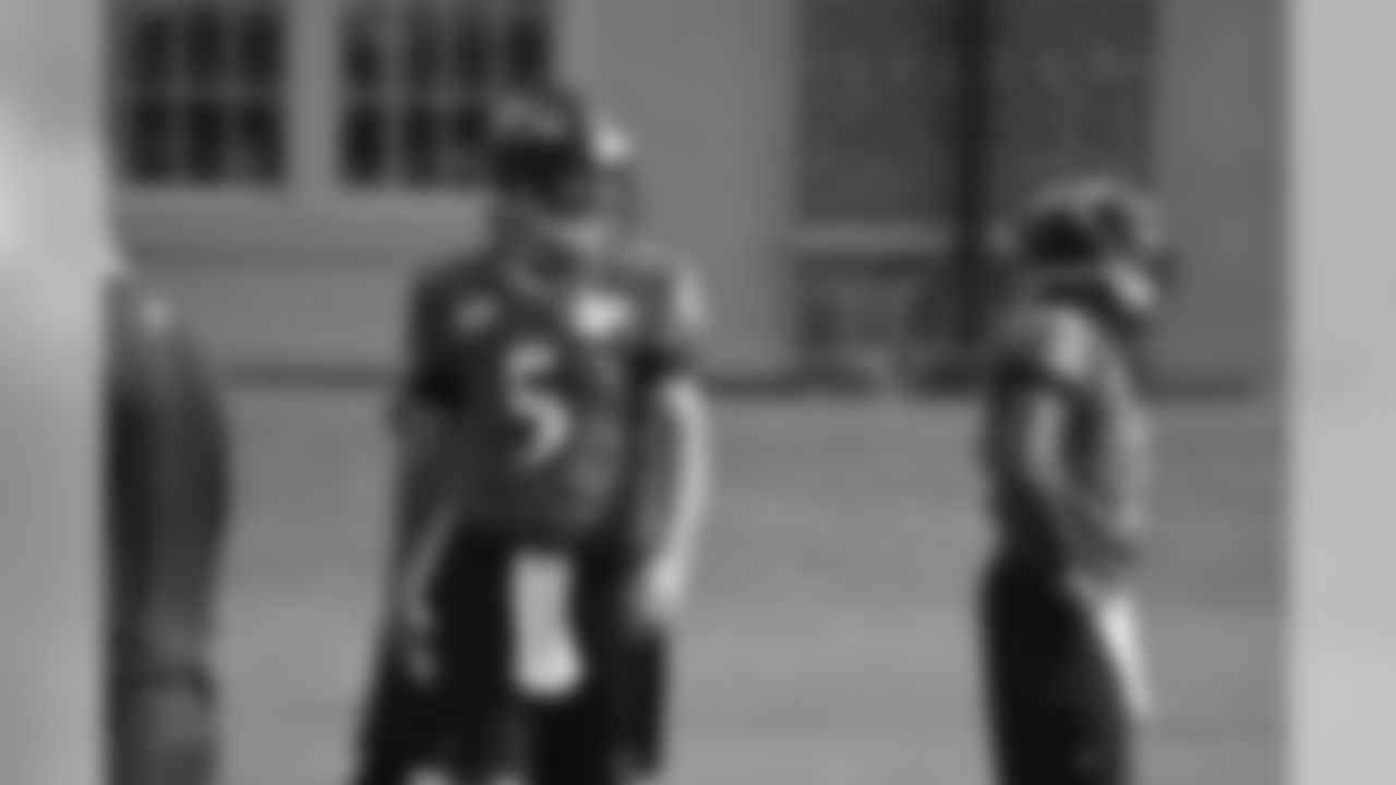 Joe Flacco and Tyrod Taylor at training camp practice.