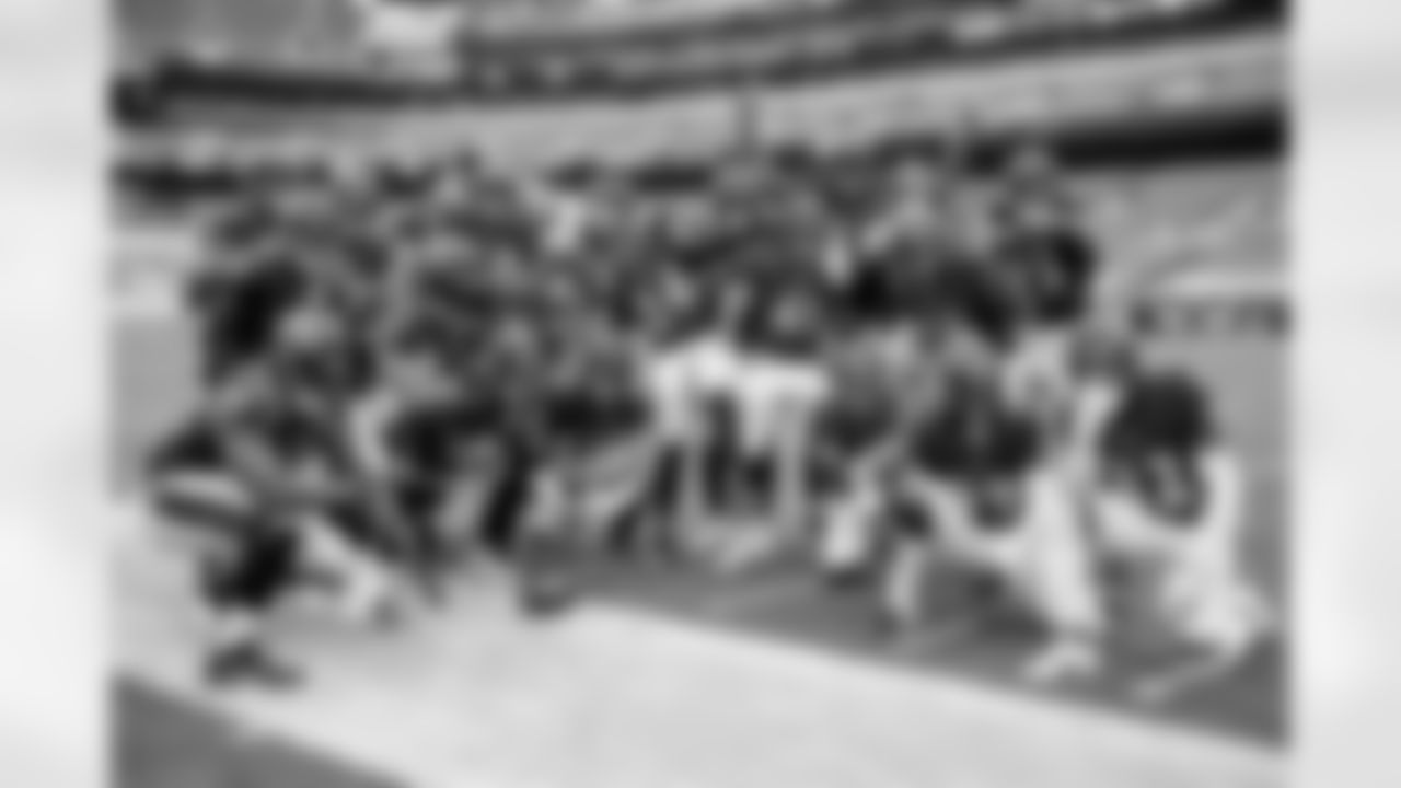The defense celebrates an interception by CB Marcus Peters / The Baltimore Ravens defeated the Cincinnati Bengals by a score of 27-3 at M&T Bank Stadium on October 11, 2020 in Baltimore, MD.