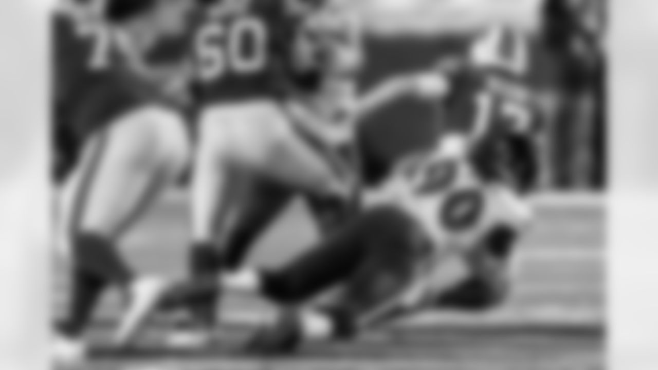 Baltimore Ravens OLB Pernell McPhee (90) sacks Buffalo Bills QB Josh Allen (17) in a NFL Divisional game on January 16, 2021 at Bills Stadium