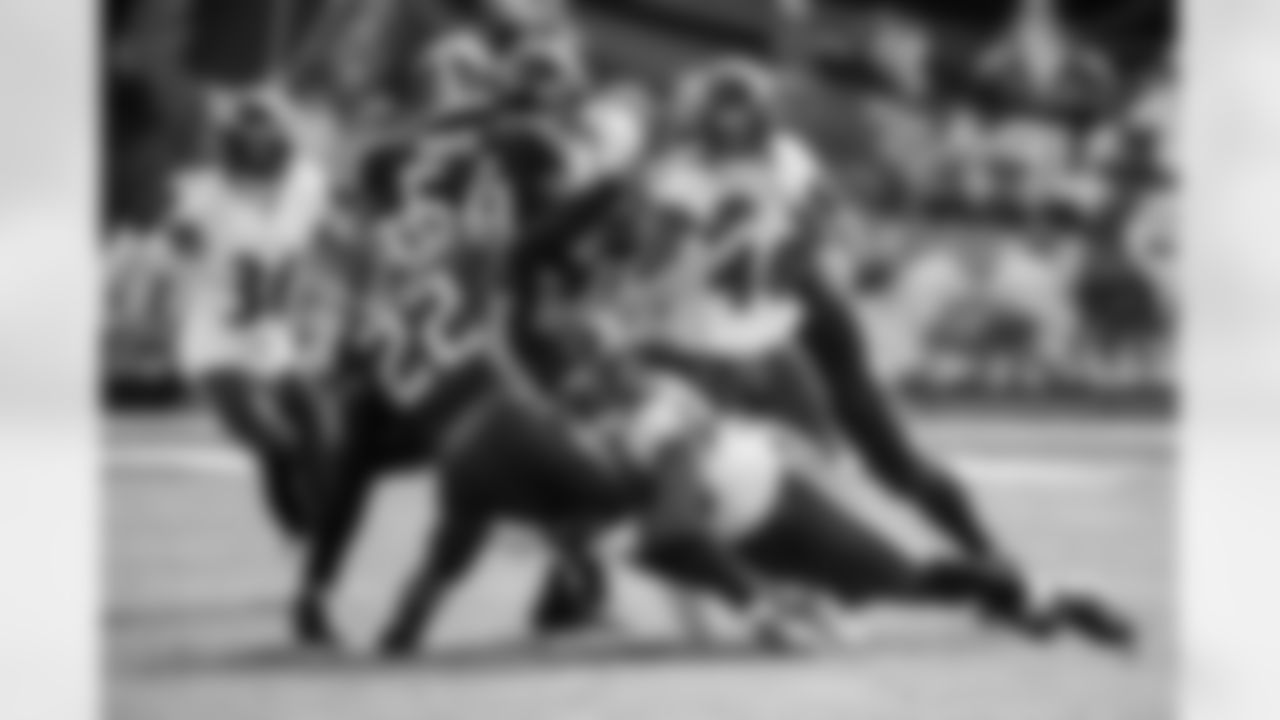 Baltimore Ravens OLB Pernell McPhee (90) tackles Tennessee Titans RB Derek Henry (22) in a NFL Wild Card game on January 10, 2021 at Nissan Stadium