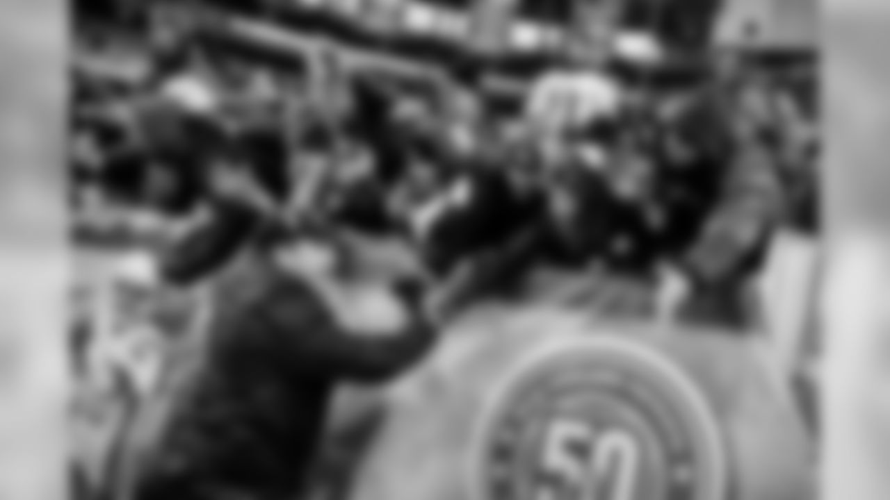 The Ravens celebrate their their historic 33-14 wild card win in New England. Head Coach John Harbaugh high-fived Ravens fans around the edge of the stadium before joining his team in the locker room.