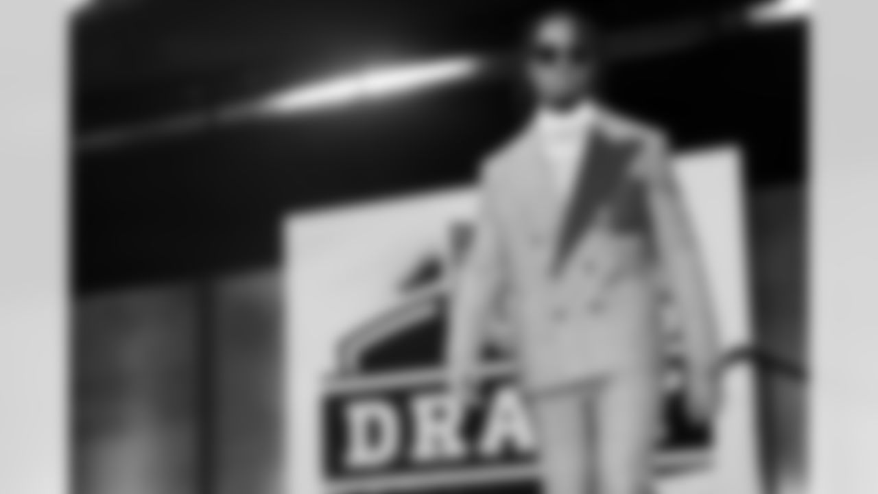 Alabama wide receiver Jaylen Waddle walks on stage during the 2021 NFL Draft on Thursday, April 29, 2021 in Cleveland, Ohio. (Ben Liebenberg/NFL)