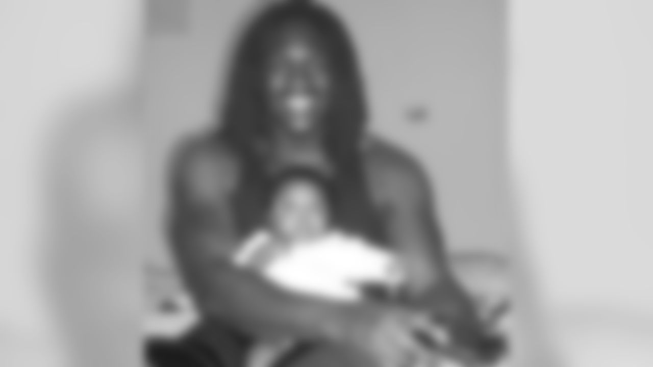 jab56 [Josh Bynes]: #tbt Old pic of me and my son when he was some months old! #backinAU #stillplayedmyplaystation lol #multi-tasking #heDEFINITELYhasmylips #soupcoolers lmao