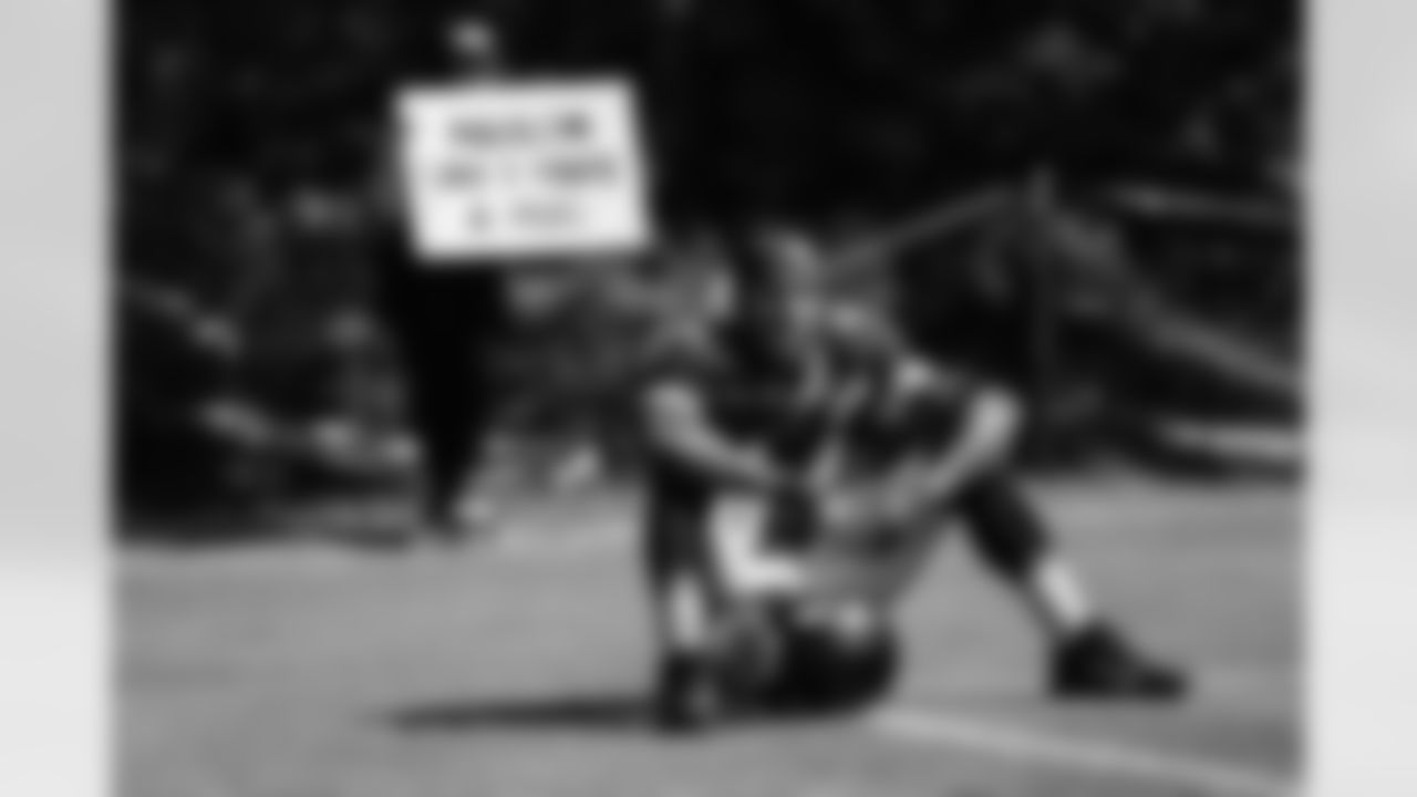 CB Marlon Humphrey (44) sits on the sideline at training camp on August 11, 2021.