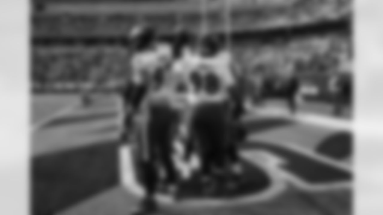 Ravens players take the field