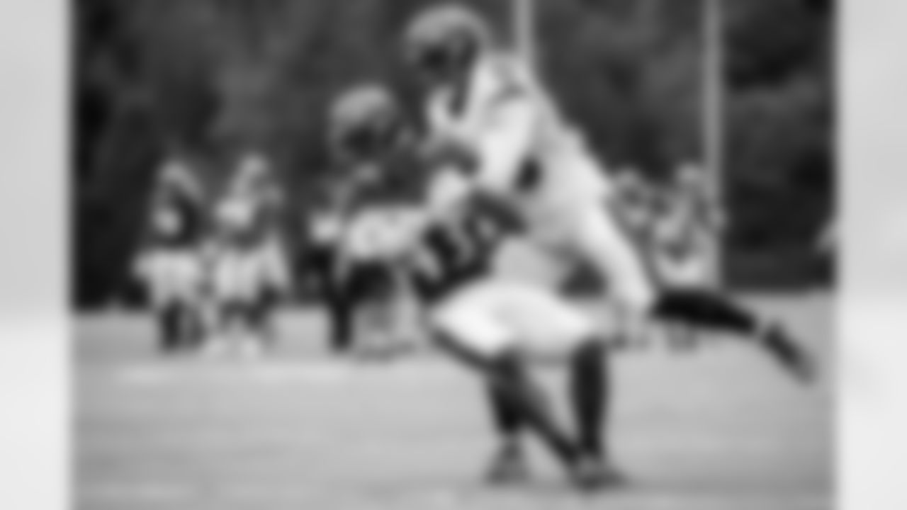 RB Justice Hill and LB Patrick Queen