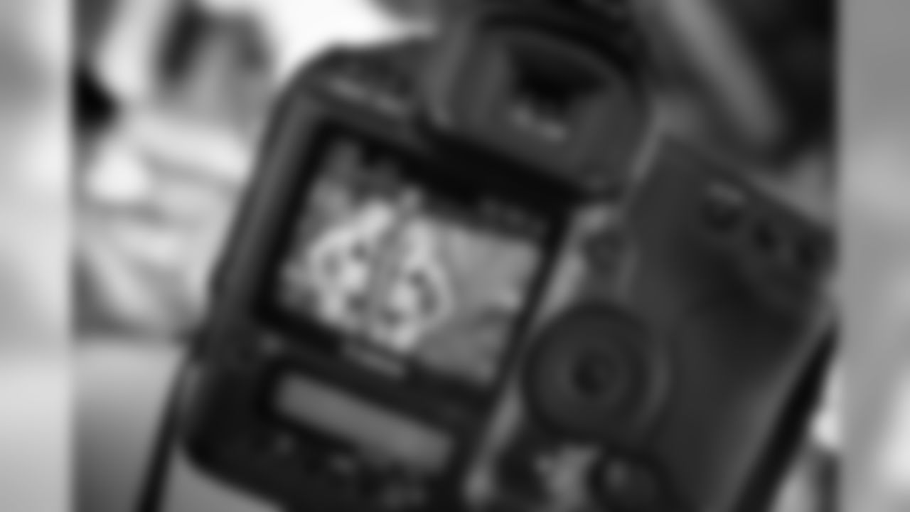 A look behind the photographer's camera during Chase and Paige's photo shoot.