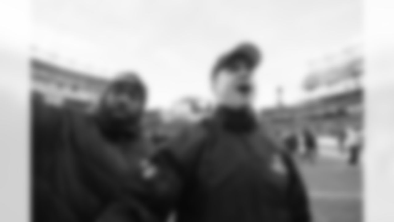 The Ravens celebrate their their historic 33-14 wild card win in New England. Head Coach John Harbaugh high-fived Ravens fans around the edge of the stadium before joining his team in the locker room.