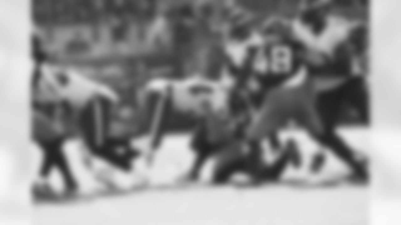 Ravens players in action