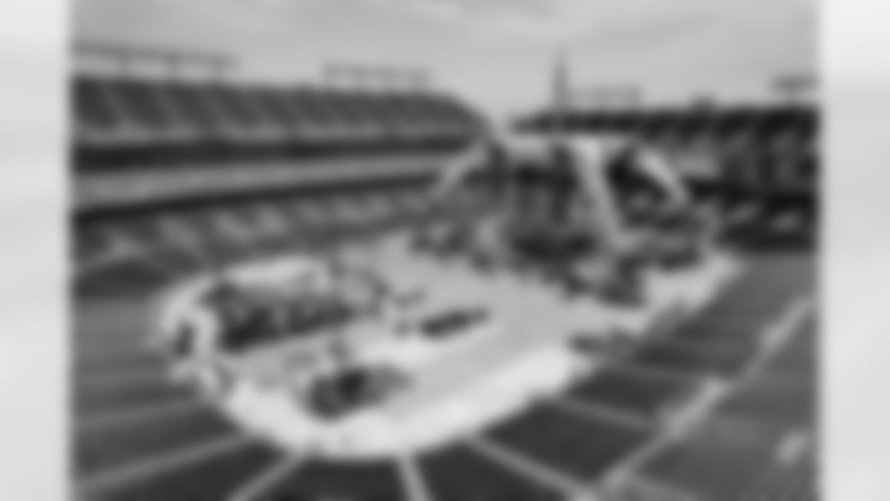 Workers build the unique stage for U2's 360-Degree Tour at M&T Bank Stadium.