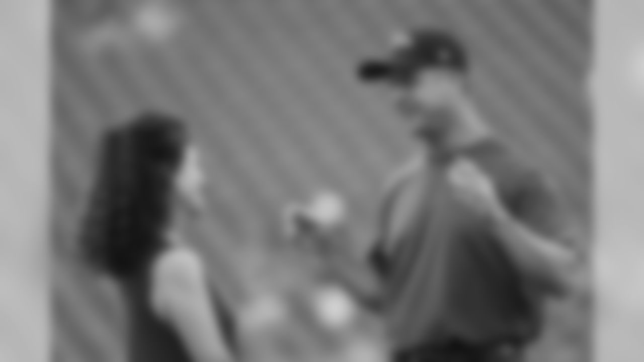 Baltimore Ravens head coach John Harbaugh, right, talks with Philadelphia Eagles' Christina Weiss Lurie before a preseason NFL football game, Thursday, Aug. 22, 2019, in Philadelphia. (AP Photo/Michael Perez)