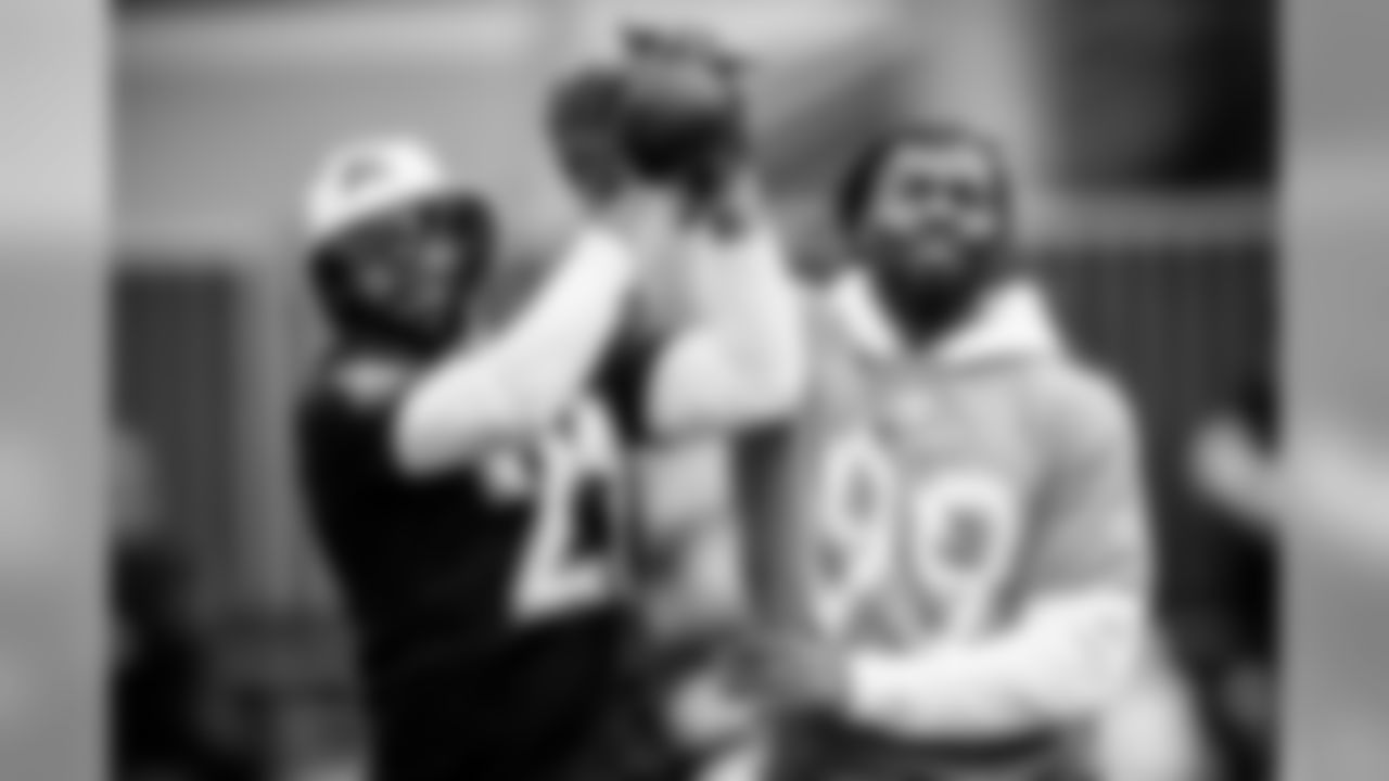 Running back Mark Ingram II catches a pass in front of outside linebacker Matthew Judon during the 2020 Pro Bowl practice, Thursday, Jan. 23, 2020 in Orlando, Fla.