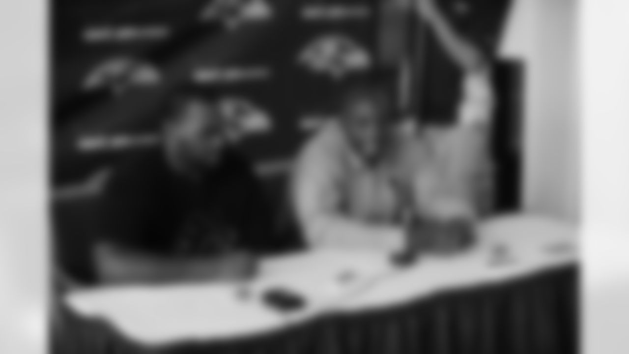 Tackle Michael Oher and General Manager & Executive VP Ozzie Newsome talk with the media during a press conference following the first-round draft pick's signing.