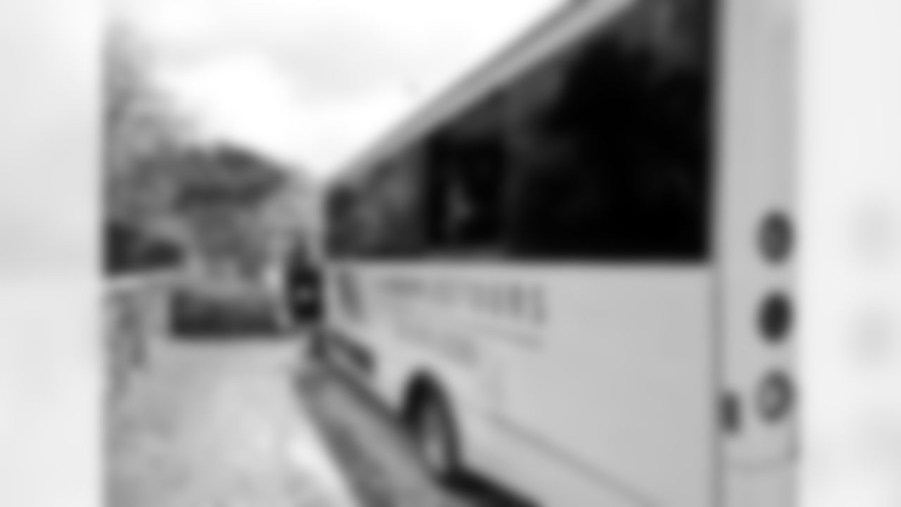 The side of the bus with one window missing after it was side-swiped by a truck on the way to the hotel. (Photo by Rob Bartlett)