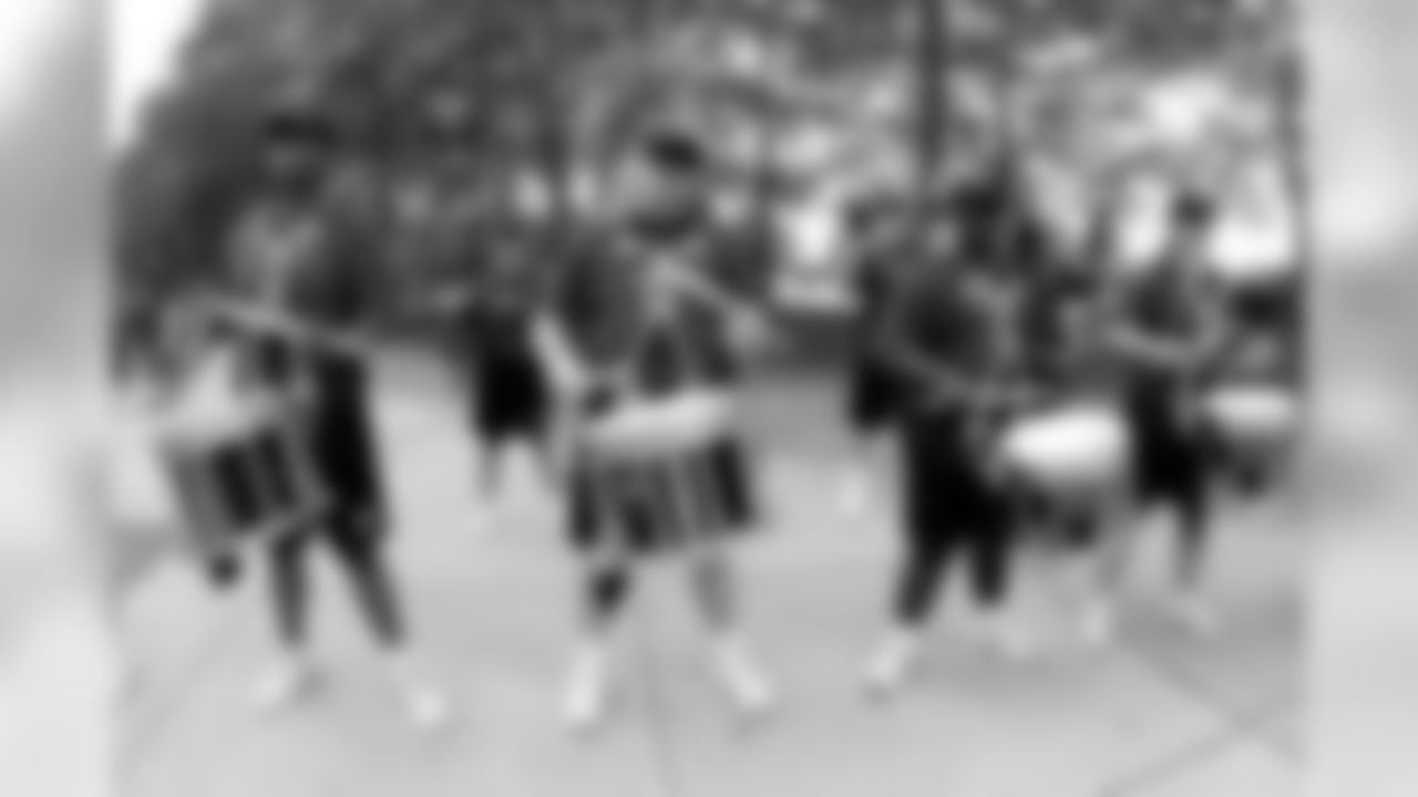 The Baltimore Ravens and Orioles partnered to present O's-Ravens Rally Night at Oriole Park at Camden Yards on Saturday, June 12. Ravens Head Coach John Harbaugh threw out the first pitch and the Ravens' mascot, Poe, cheerleaders and band, the Marching Ra