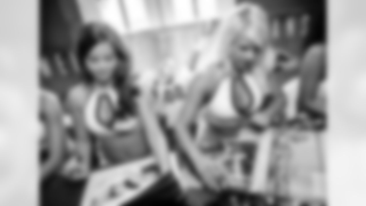 The Baltimore Ravens Cheerleaders gather at High Topps Backstage Grille in Timonium, MD to autograph swimsuit calendars in 2008.
