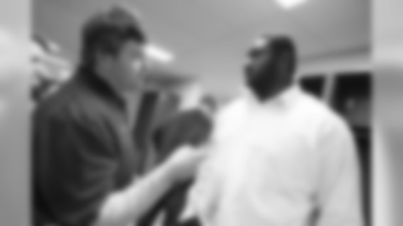 The Ravens celebrate their their historic 33-14 wild card win in New England. Head Coach John Harbaugh high-fived Ravens fans around the edge of the stadium before joining his team in the locker room.