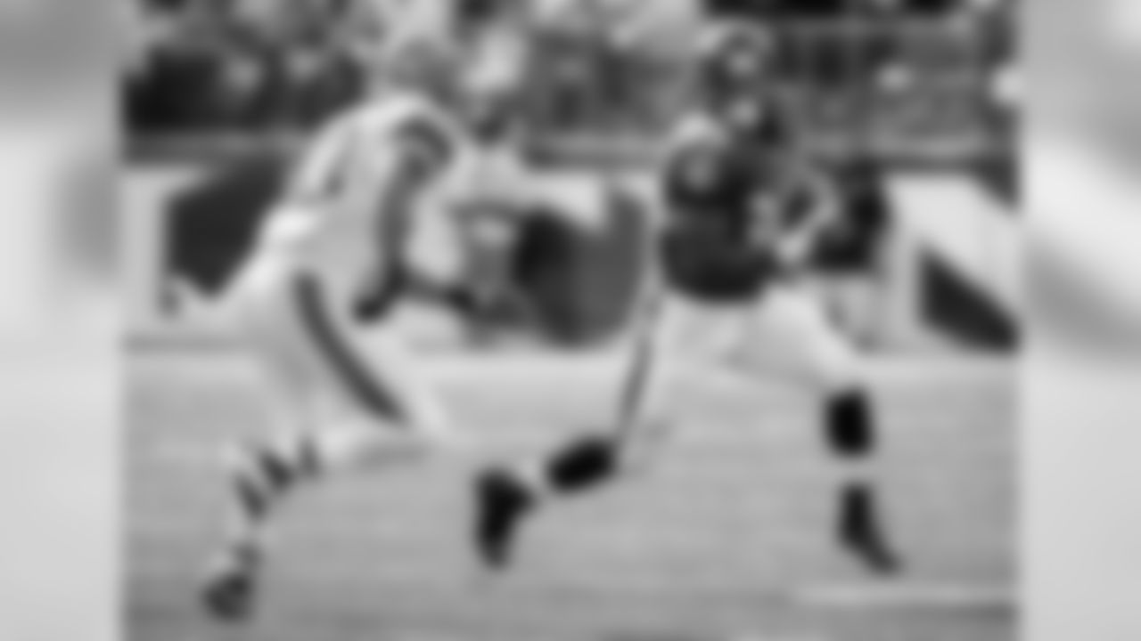 Running back Bernard Pierce looks to make a move on Browns safety T.J. Ward in the secondary. Pierce finished the day with 19 carries for 57 yards.