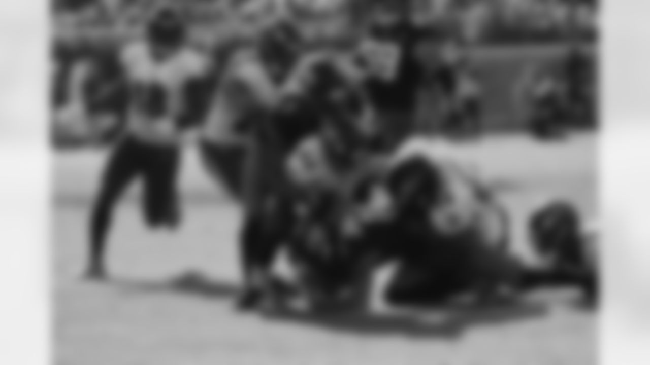 Ravens players in action