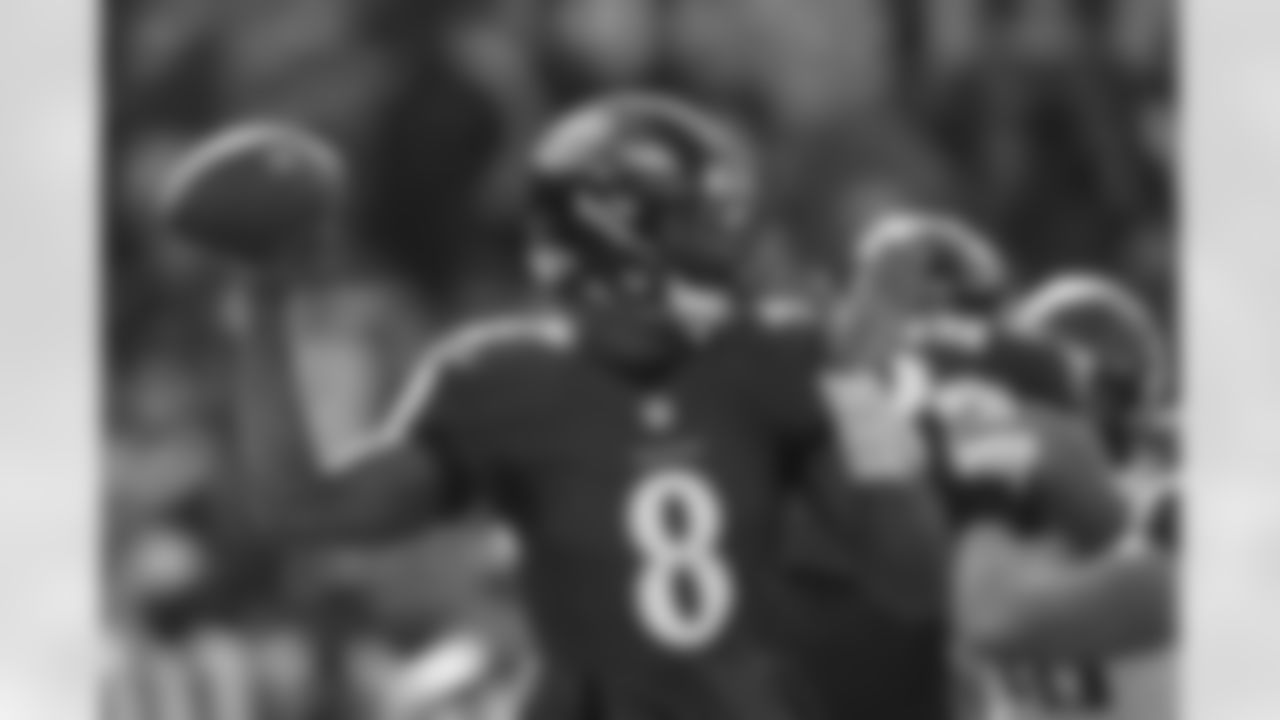 Baltimore Ravens quarterback Lamar Jackson (8) throws the ball during the first half of an NFL football game against the Minnesota Vikings, Sunday, Nov. 7, 2021, in Baltimore.