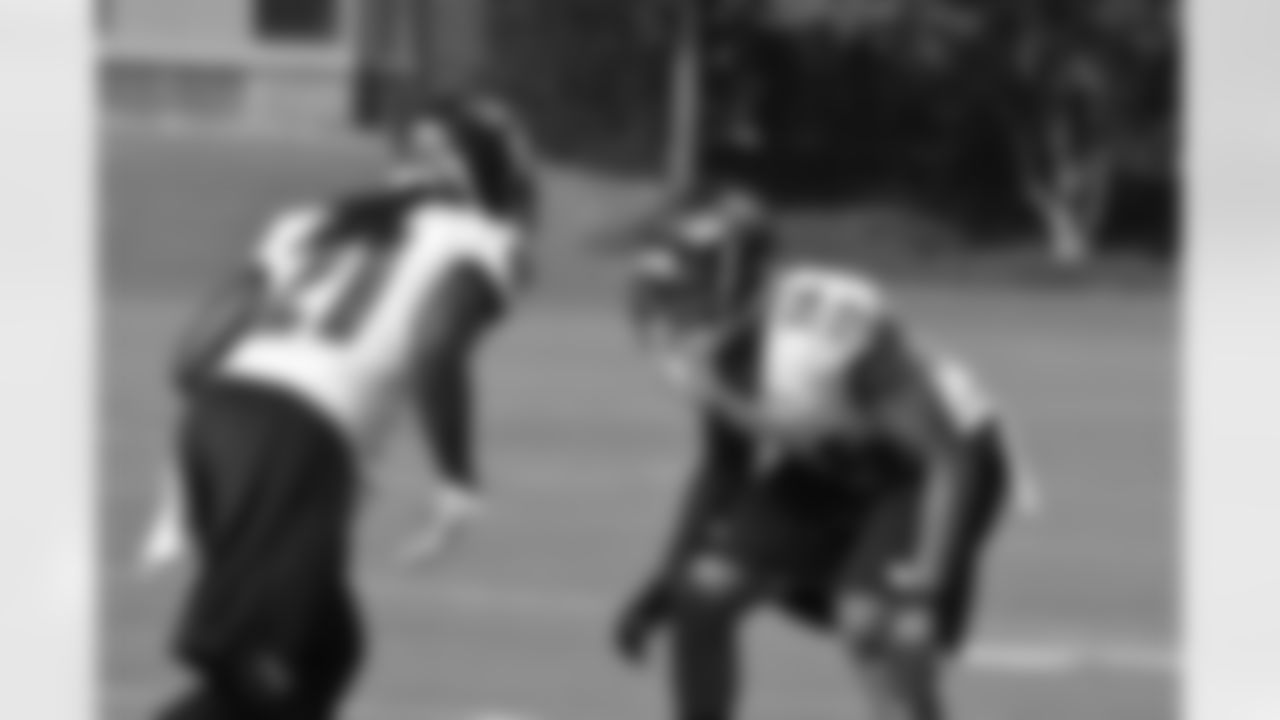 Lardarius Webb and Marc Anthony participate in a drill at training camp.