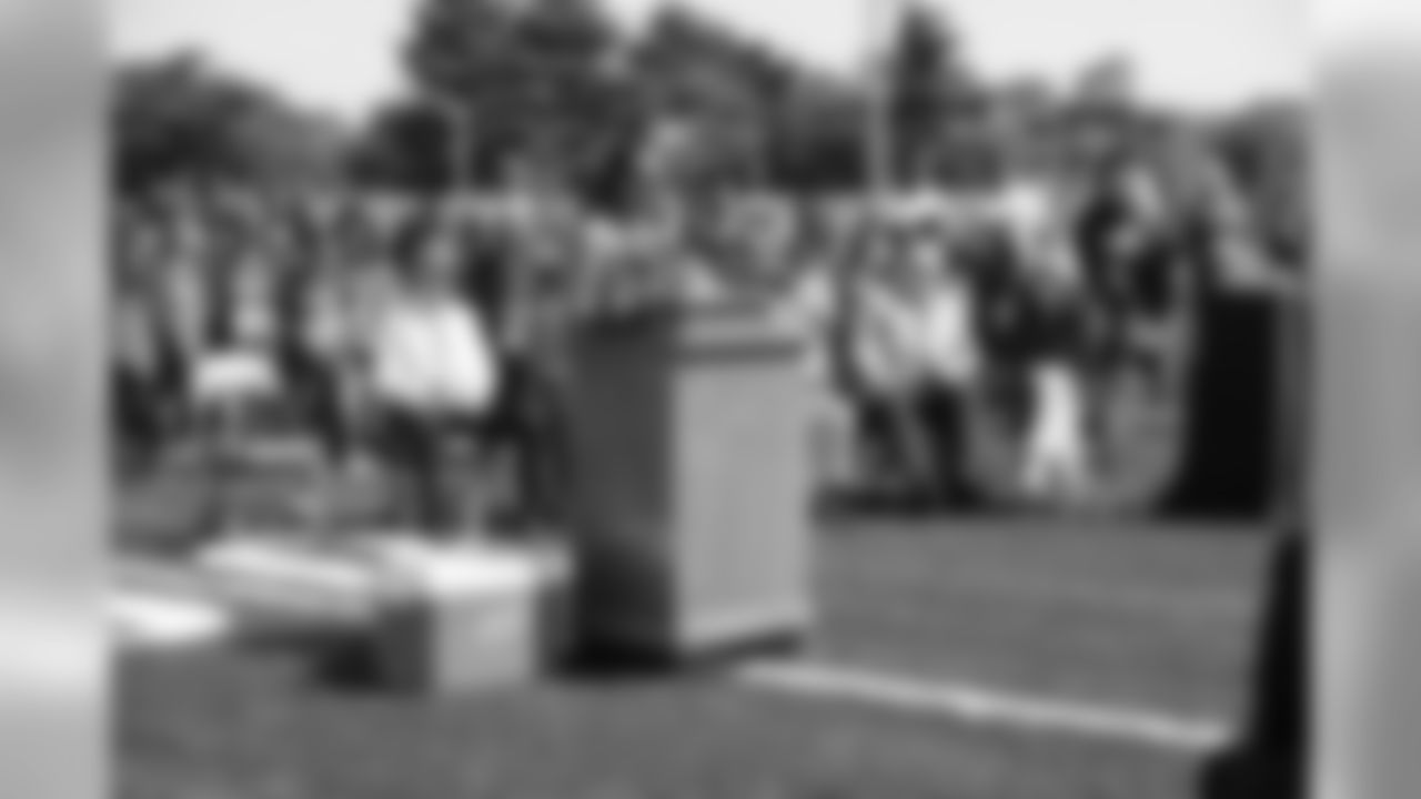 The Ravens All Community Team Foundation, Ravens owner Steve Bisciotti, CB Chris McAlister and the NFL Youth Football Fund gather at Mergenthaler Vocational Technical High School (Mervo) to dedicate the refurbished stadium in August 2008.