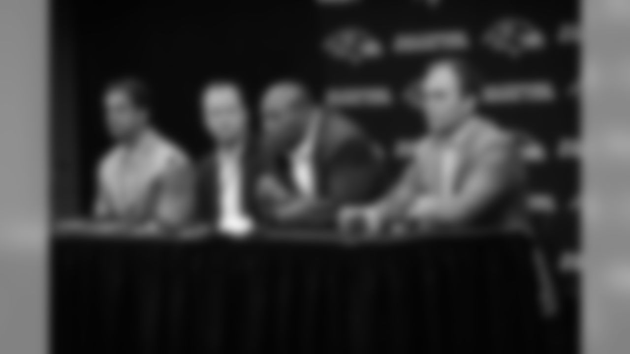 2009 Ravens first-round draft pick Michael Oher is introduced by GM Ozzie Newsome, Head Coach John Harbaugh and Director of Player Personnel Eric DeCosta at a press conference at the Ravens' Owings Mills Training Facility in April 2009.