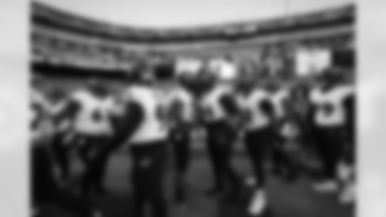 Ravens players take the field