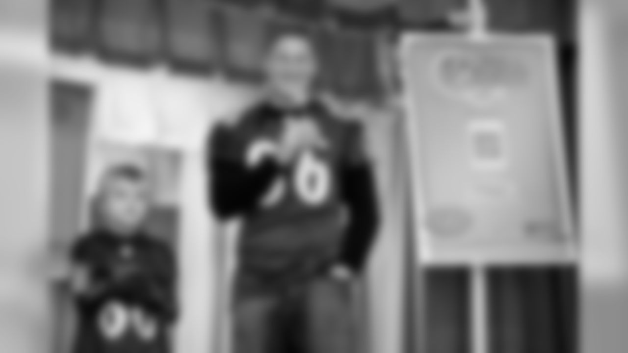 Todd Heap went to Elkridge Elementary School with new friend, fifth-grader Travis Justice, as part of the Take a Player to School program. Heap spoke to the students about the NFL's Play 60 campaign to stay active before heading out to the playground.