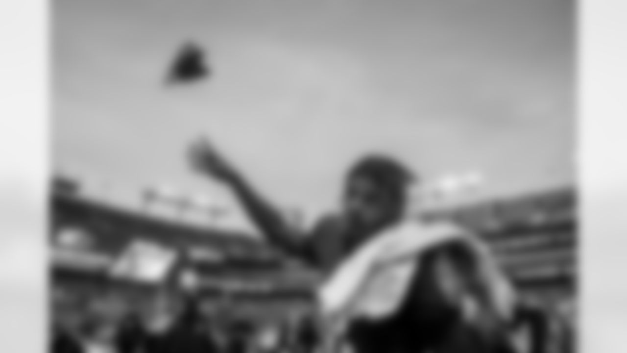 QB Lamar Jackson (8) throws a towel to fans after a game against the Minnesota Vikings at M&T Bank Stadium on November 7, 2021.