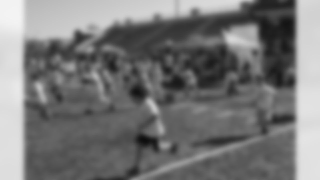More than 700 children attended Ray Rice Day on Saturday, May 12, 2012. Rice was joined by Ravens teammates Anthony Allen, Torrey Smith and LaQuan Williams, who helped run the football camp.