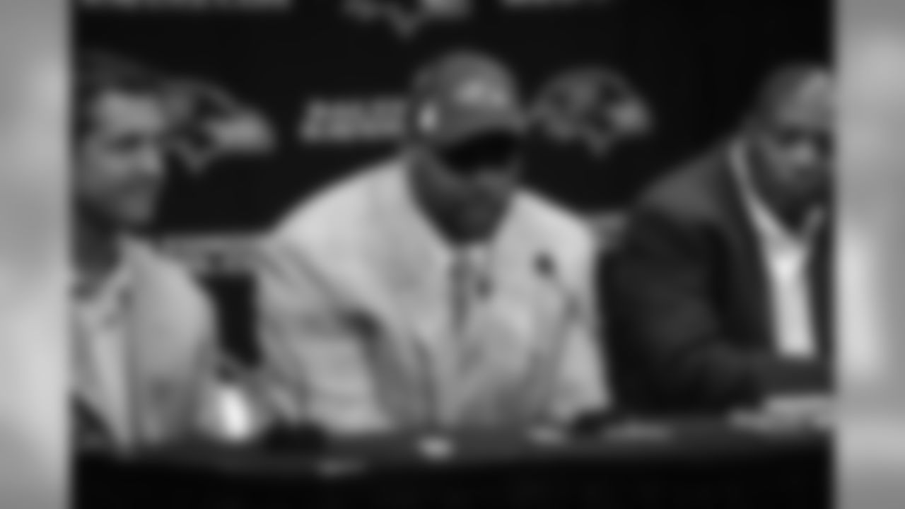 2009 Ravens first-round draft pick Michael Oher is introduced by GM Ozzie Newsome, Head Coach John Harbaugh and Director of Player Personnel Eric DeCosta at a press conference at the Ravens' Owings Mills Training Facility in April 2009.