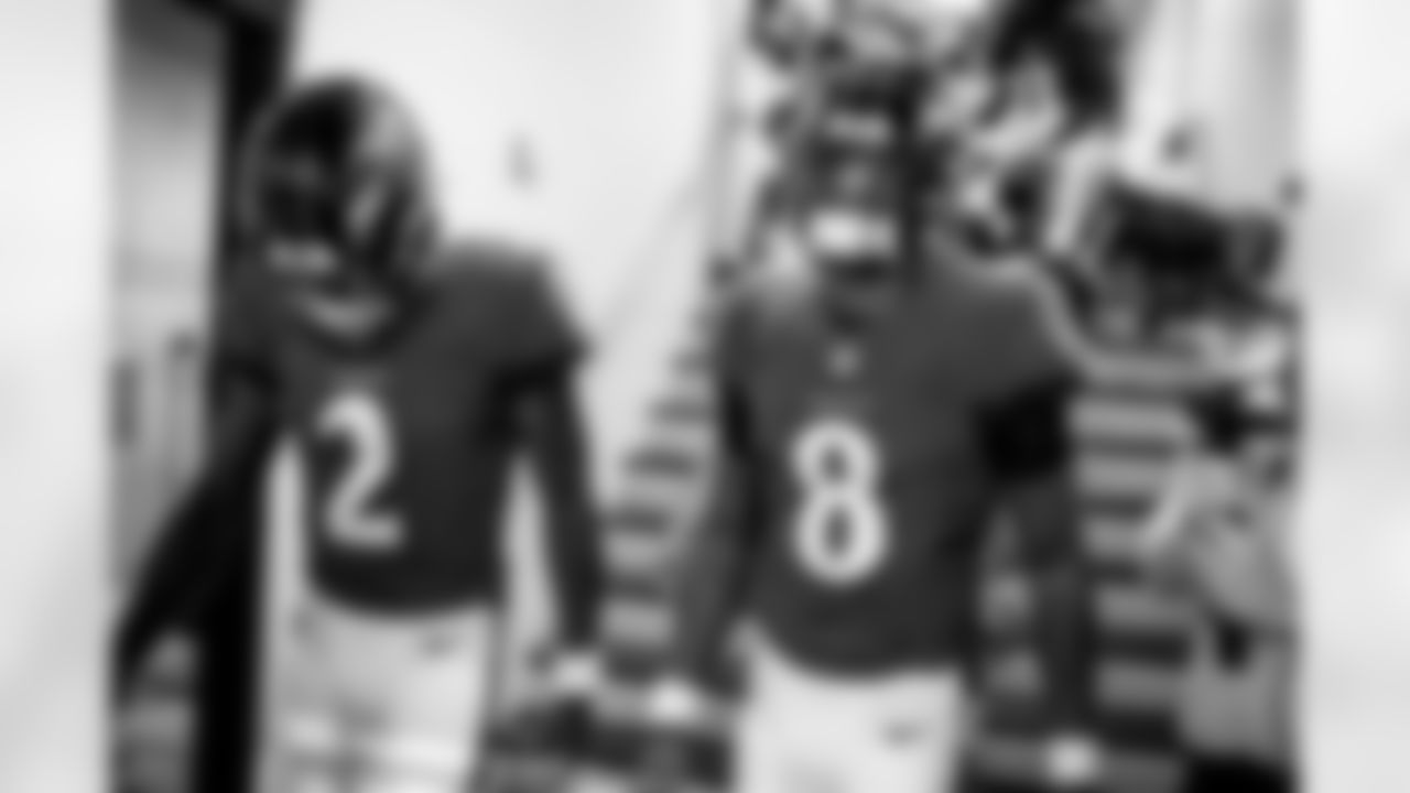 QB Lamar Jackson and QB Tyler Huntley