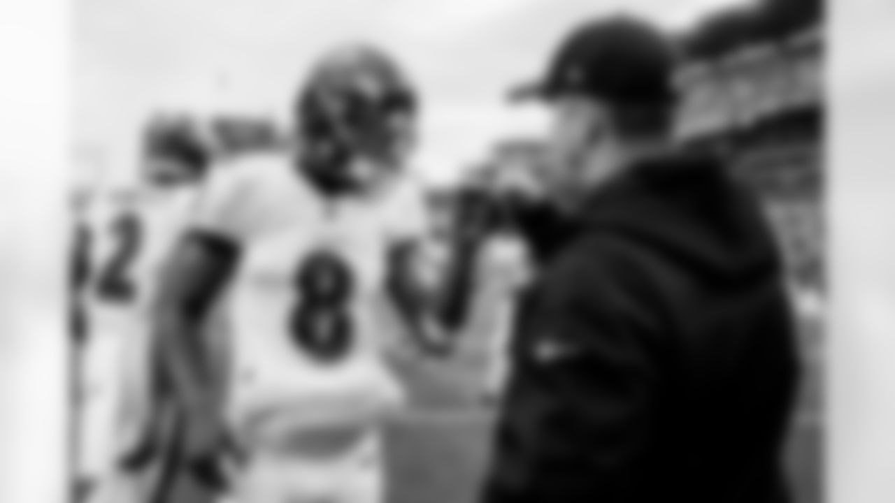 QB Lamar Jackson and John Harbaugh