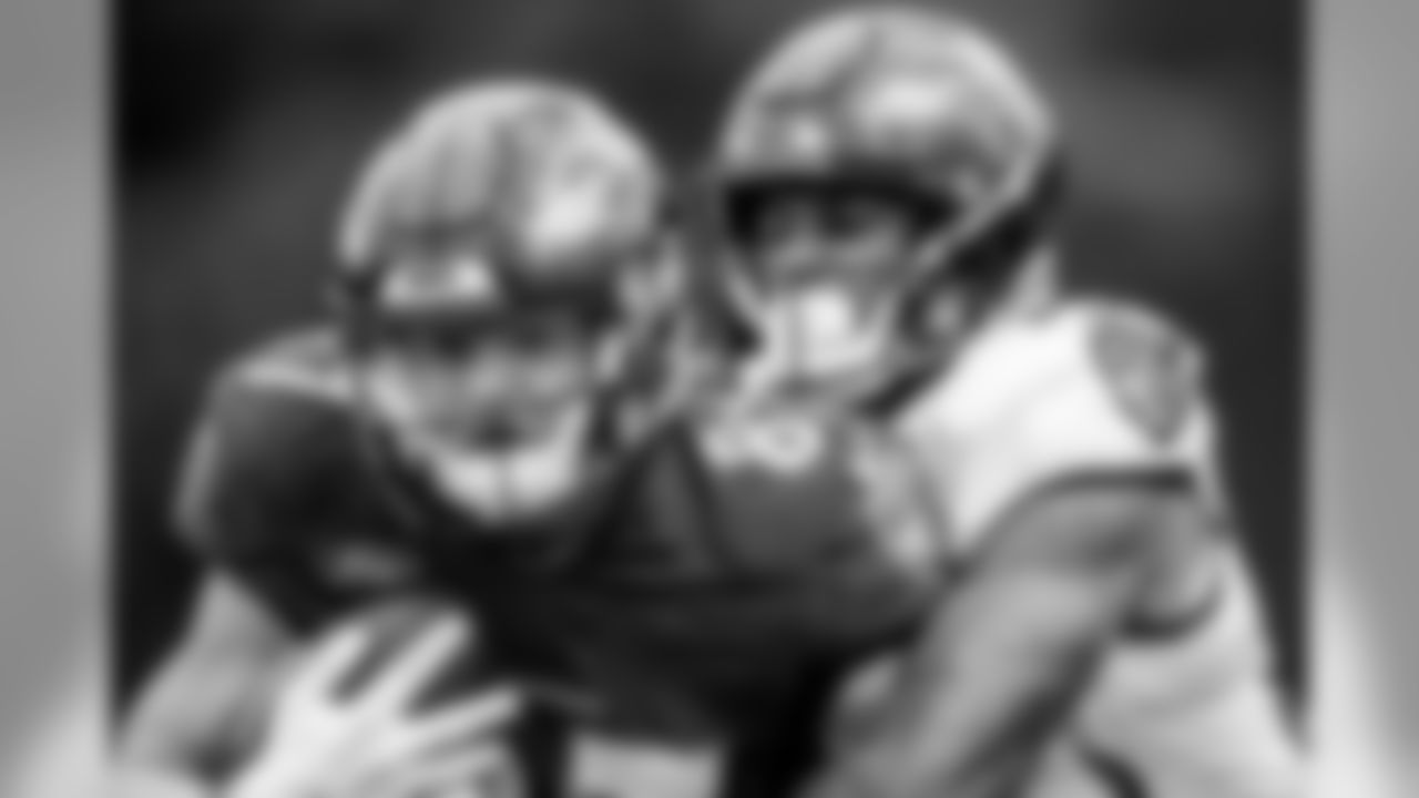 S Geno Stone defends TE Eli Wolf
