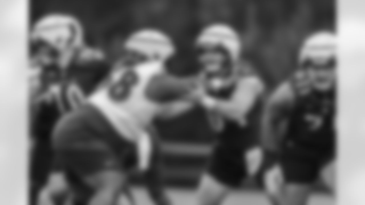 From left: NT Michael Pierce, C Tyler Linderbaum