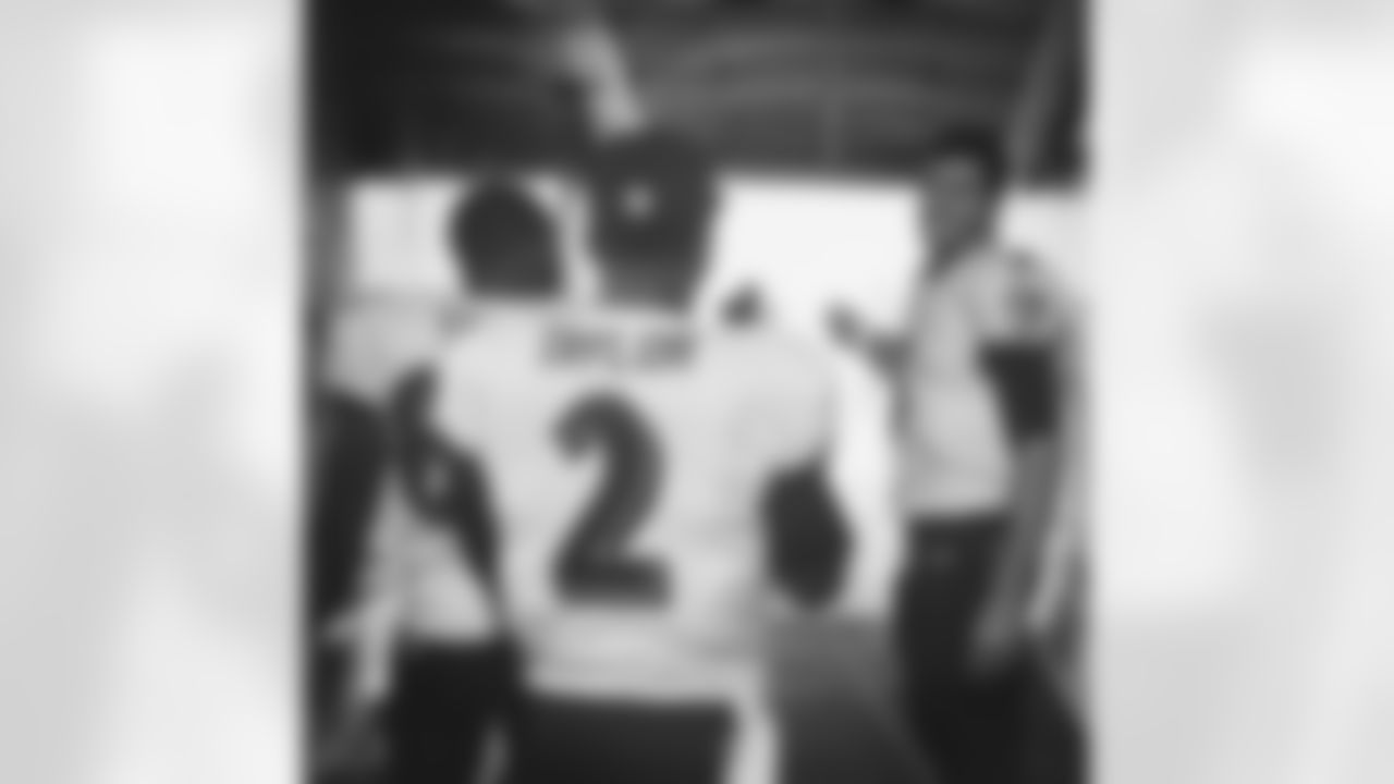 ravens [Baltimore Ravens]: @torreysmithwr,[Torrey Smith] @tytaylor2 [Tyrod Taylor] & Joe #Flacco in the #Ravens #tunnel during the weather delay. #gameday #BALvsCHI