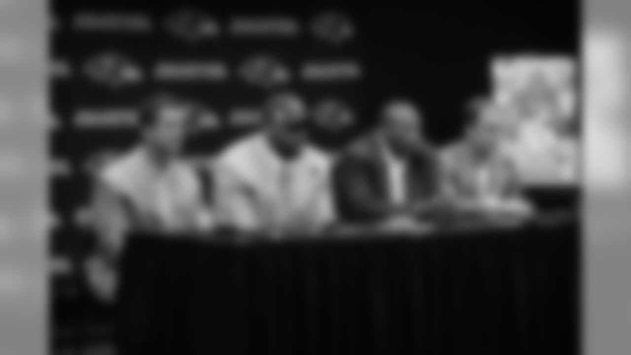 2009 Ravens first-round draft pick Michael Oher is introduced by GM Ozzie Newsome, Head Coach John Harbaugh and Director of Player Personnel Eric DeCosta at a press conference at the Ravens' Owings Mills Training Facility in April 2009.