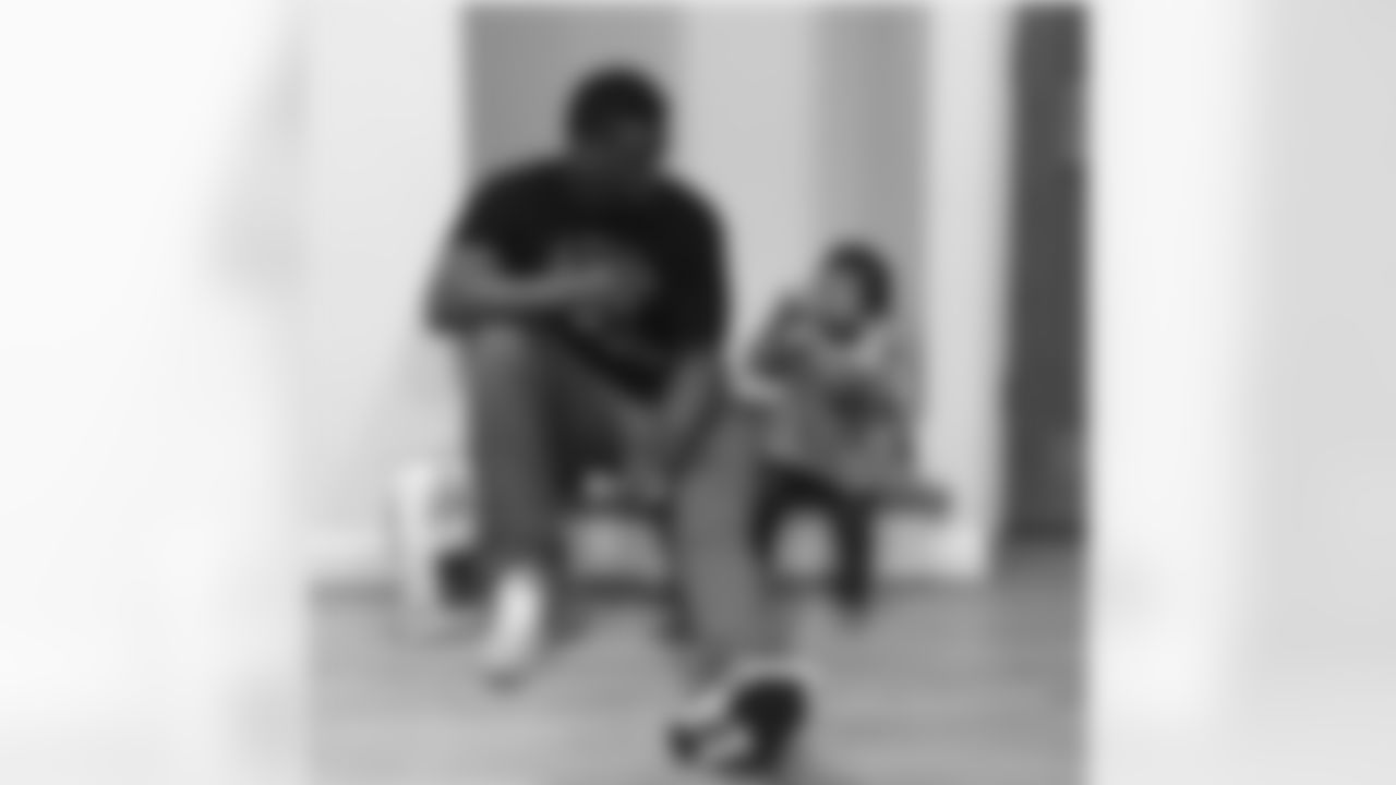 benjaminswatson [Benjamin Watson]: Snack time on the bottom step. Our special spot. #daddysgirl