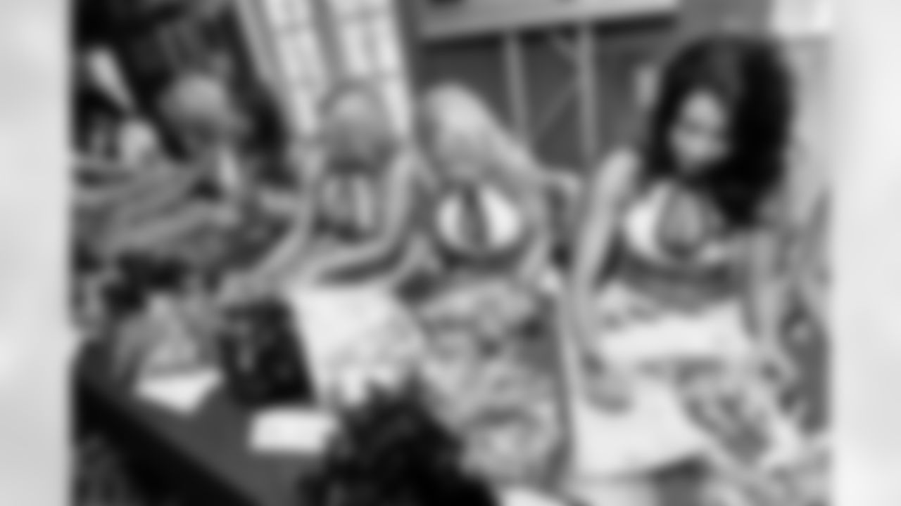 The Baltimore Ravens Cheerleaders gather at High Topps Backstage Grille in Timonium, MD to autograph swimsuit calendars in 2008.