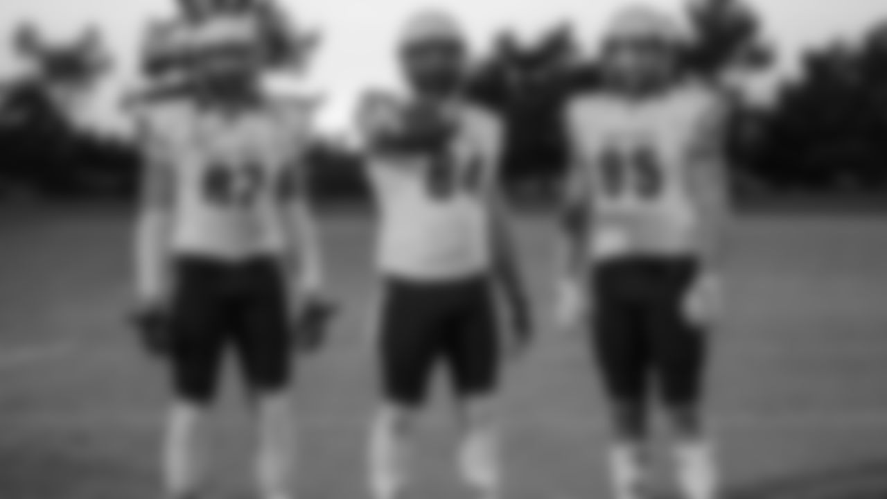 LS Matthew Orzech (center)