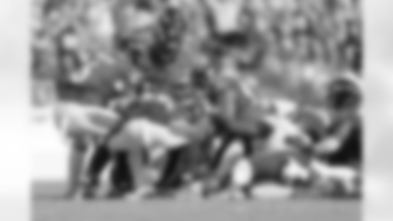 Ravens defense piles onto Bengals offense.
